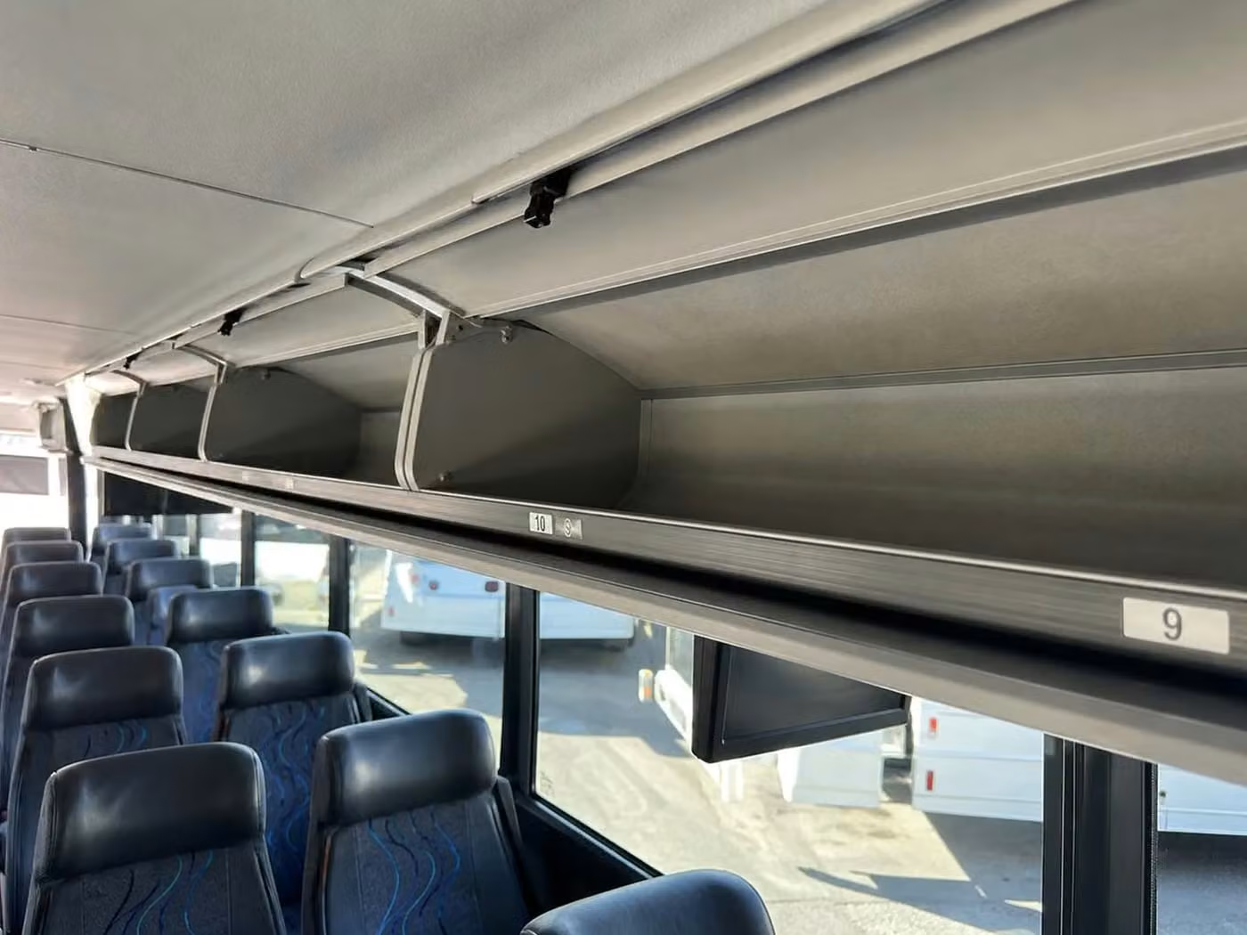 bettendorf 25 passenger minibus overhead storage