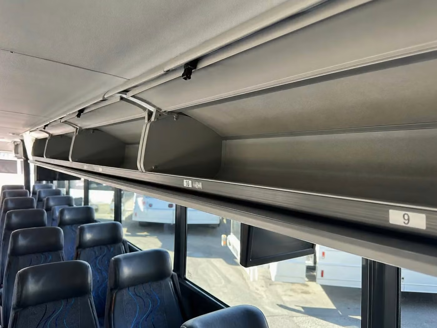 bettendorf 28 passenger minibus overhead storage