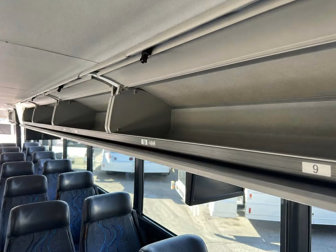 bettendorf 35 passenger minibus overhead storage