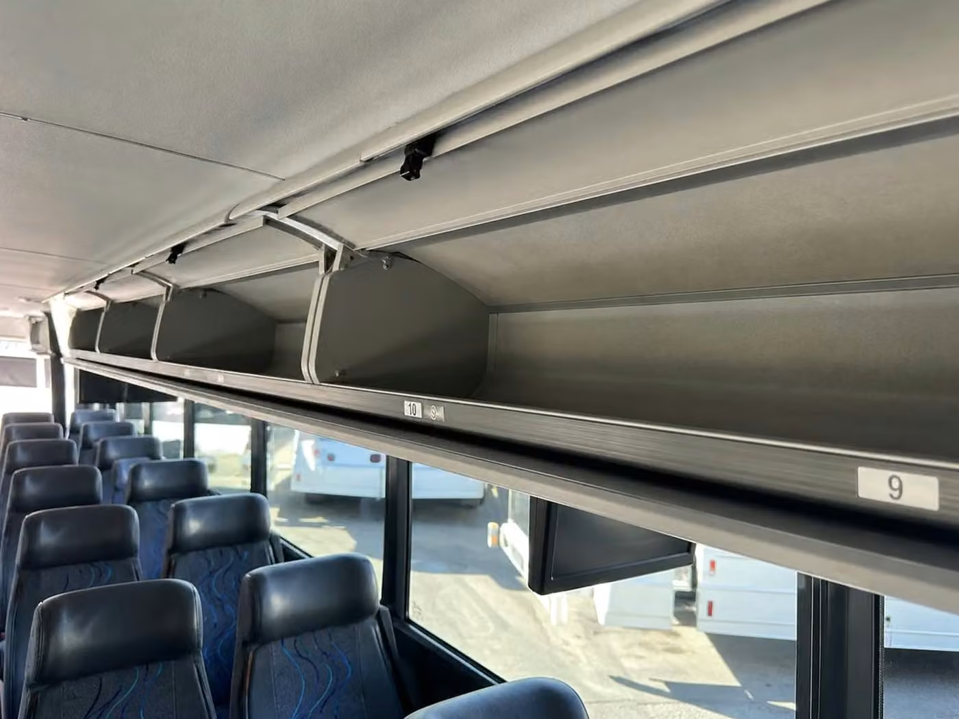 bettendorf 56 passenger charter bus overhead storage