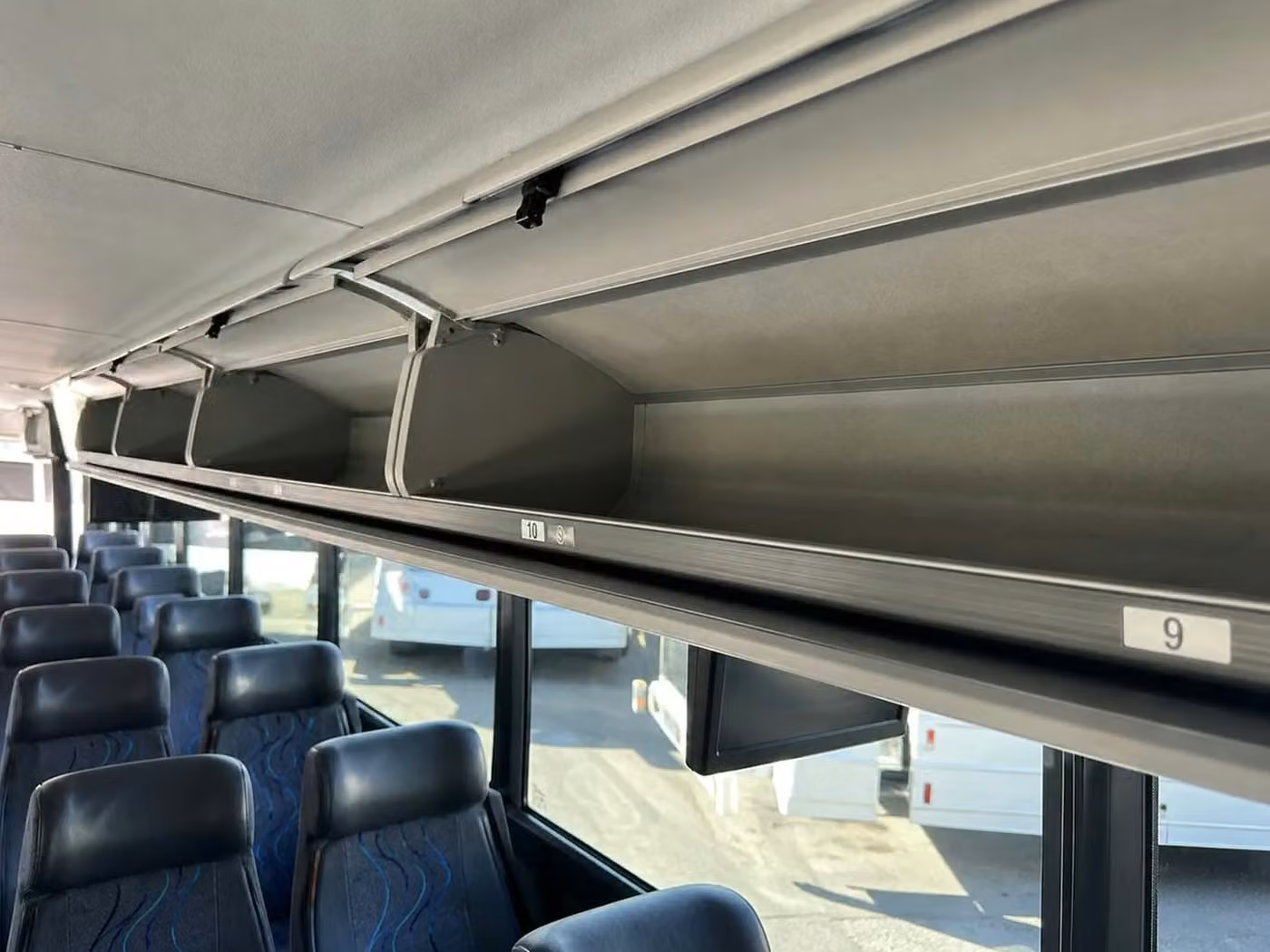 bettendorf charter bus overhead storage
